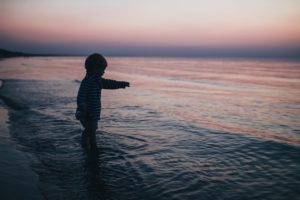 Kid In Ocean