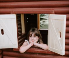 Child In Playhouse