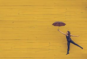 Yellow Wall Brown Umbrella